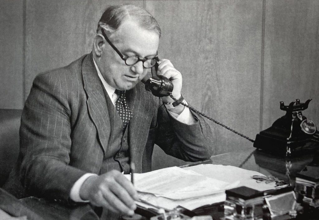 Ernest Hives, later Lord Hives, at his desk